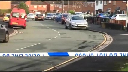 Police at the scene where a man died after theft