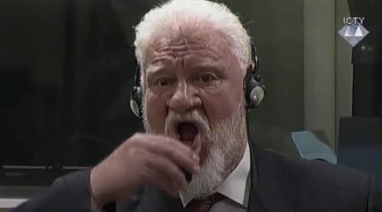 War criminal dies after taking poison during court hearing