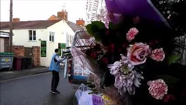 Clay Cross floral tributes after woman dies in bus collision.