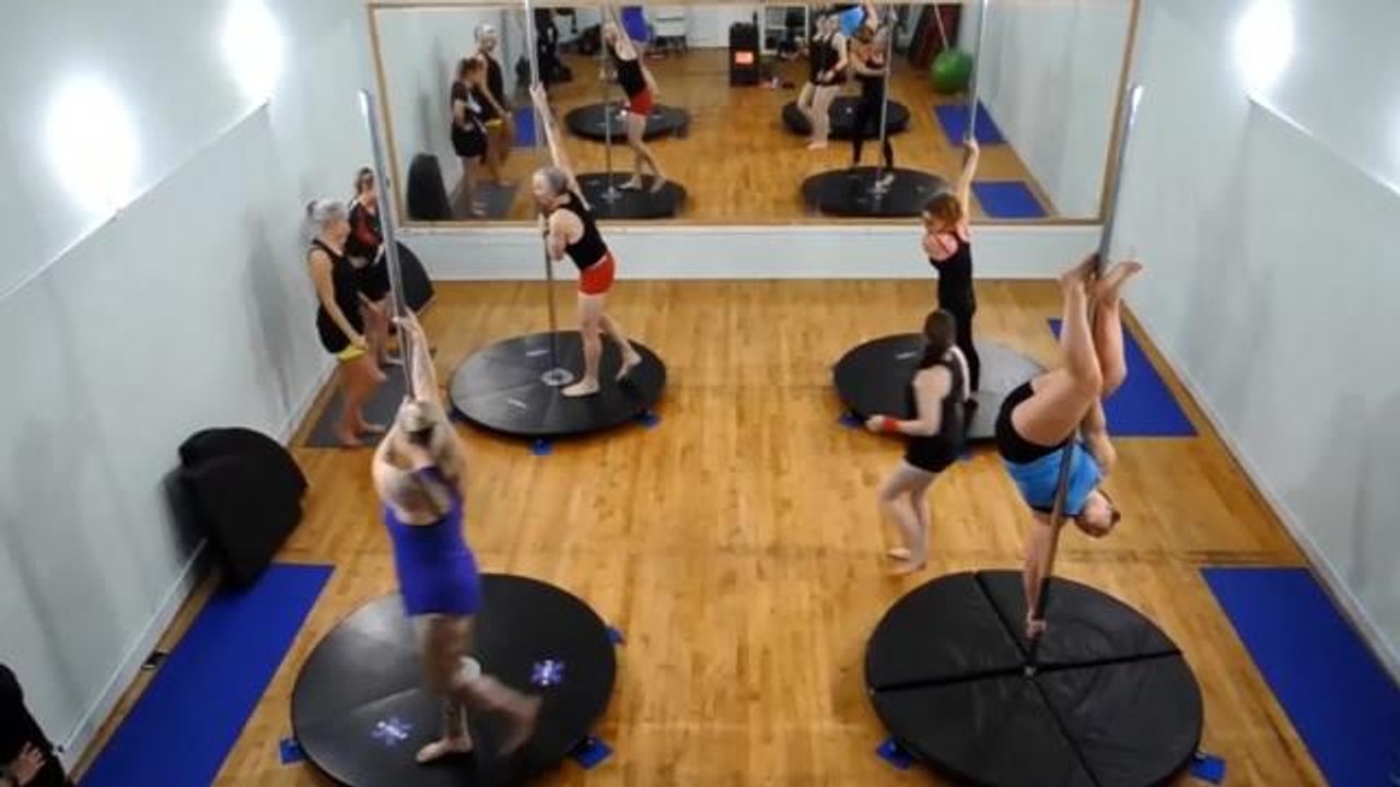Dad and daughter pole dancing duo