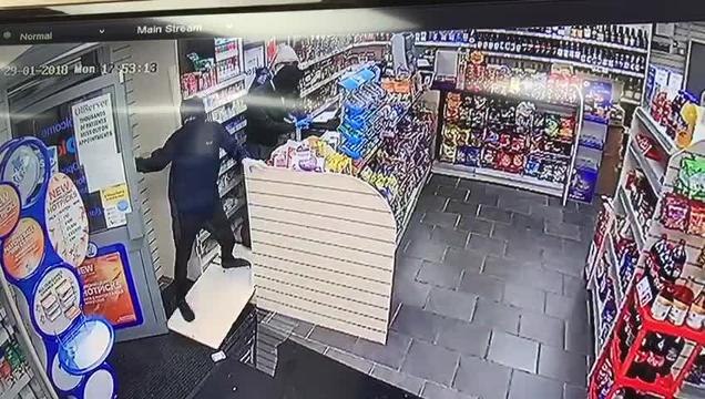 Store raiders fended off by worker