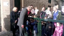 Prince Charles talks to children, staff and parents at Titspots Day Nursery in Halifax.