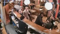CCTV shows mass brawl in bar as glasses and chairs are used as weapons