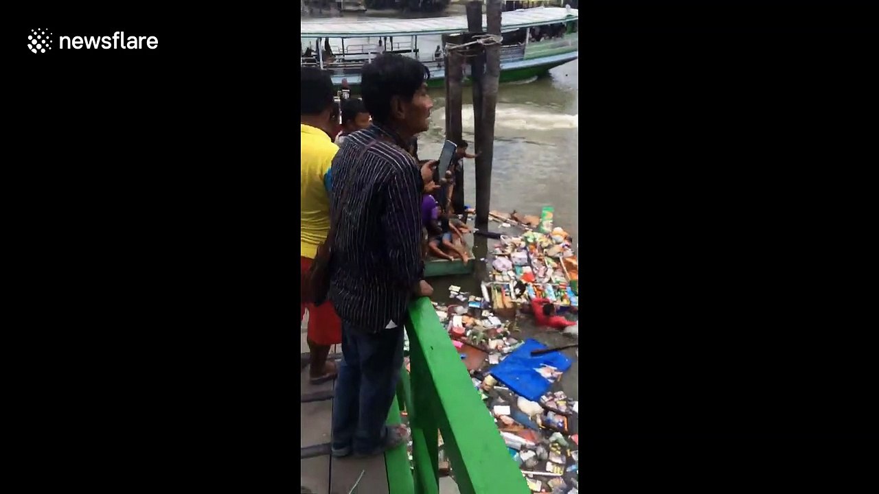 Four people missing and dozens injured after Thai temple collapses into river on first day of Buddhist Lent
