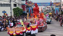 Thai locals celebrate Buddhist Lent with colourful parade that sees elephants wearing luminous attire
