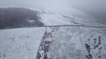 First snow of the winter falls on the Peak District