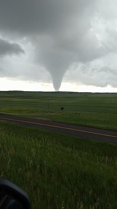 Storm Chasers Catch Tornado Touchdown