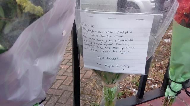 Floral tributes outside GP surgery where Connor Brown worked