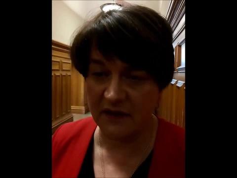 Arlene Foster signs a Book of Condolence in the Guildhall.