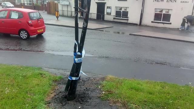 Police tape up after motorbike crash sees two men left injured
