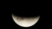 [En imágenes] Eclipse parcial: la sonrisa de la Luna medio siglo después del Apolo 11