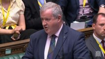 Ian Blackford slams Theresa May for go home vans