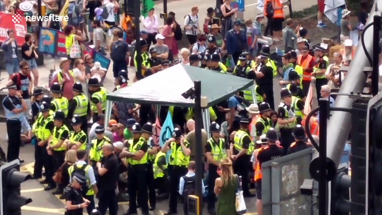 Police move in on Extinction Rebellion protesters blocking Bristol road