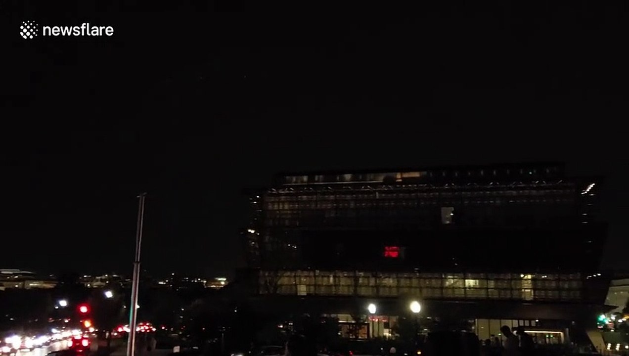 Apollo 11's Saturn V rocket projected to scale on Washington Monument to mark moon landing anniversary