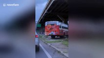 Thailand bus driver scrambles off highway to hurry to bathroom