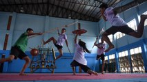 Thai teens revive neglected sword fighting tradition with blades and stunts