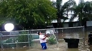 Guy Fails to Stop Flash Flood With Bucket