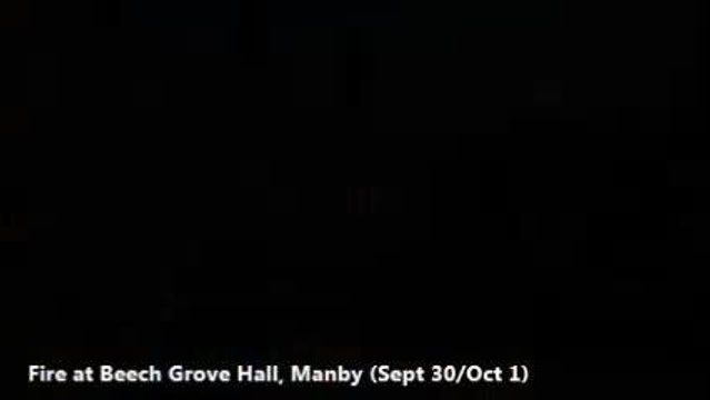 Firefighters and police at the scene of the fire in Manby.