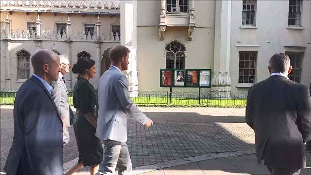 Prince Harry and Meghan Markle walking in Brighton