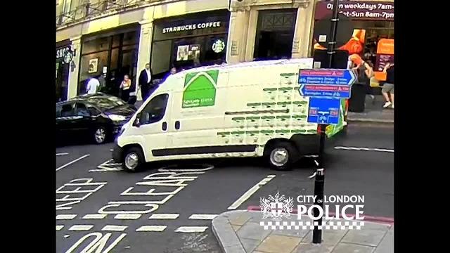 Startling CCTV footage has been released of a horrified pedestrian being shoved in front of a taxi after brushing shoulders with another man