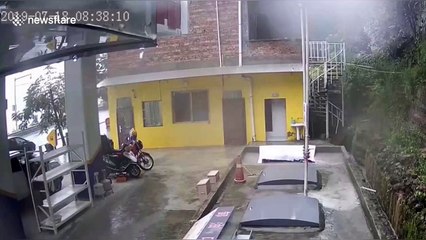 People flee from petrol station in southern China as massive landslide approaches