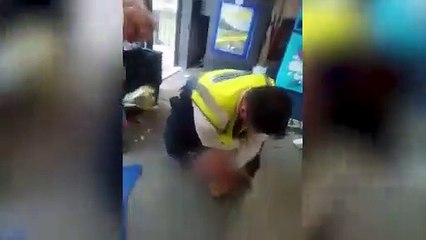 Alleged shoplifter spits at parking attendant as he restrains him