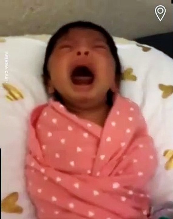 This newborn baby's reaction to her twin sisters tantrum is priceless...