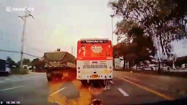 Motorcyclist has a nasty surprise after attempting a dangerous move