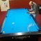 Pool Trick Shot Artist Takes Inventive Freestyle Shots With Cue Stick