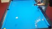 Pool Trick Shot Artist Takes Inventive Freestyle Shots With Cue Stick