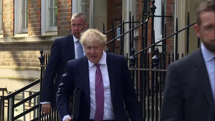 Boris Johnson arrives at campaign headquarters in London