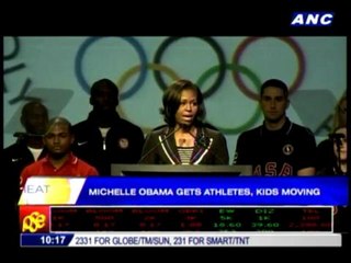 Michelle Obama gets athletes, kids moving