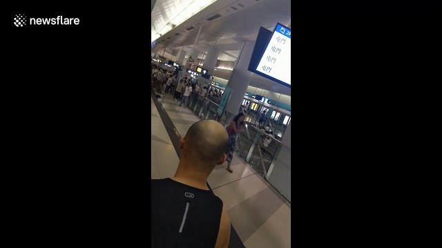 Armed mob in white T-shirts attack Hong Kong commuters on train at Yuen Long station