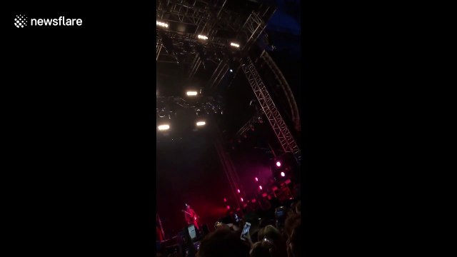 Audience giggles as singer Lewis Capaldi hilariously goes to toilet mid-set with mic attached