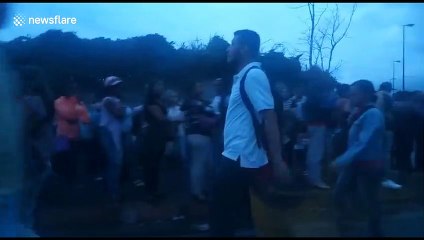 Commuters in Venezuela's Caracas forced to walk in the dark amid nationwide blackout