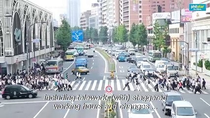 To avoid Olympic chaos, Tokyo tells workers: stay home