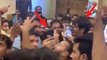 Sara Ali Khan mobbed by fans; Kartik Aaryan protect her; Check Out | FilmiBeat