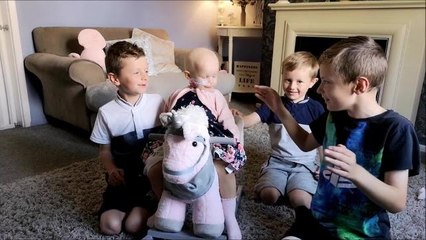 Willow playing with her brothers