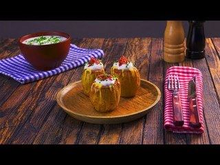 Ein köstlicher Berg, den man gerne bezwingt: Gefüllte Grill-Kartoffel.