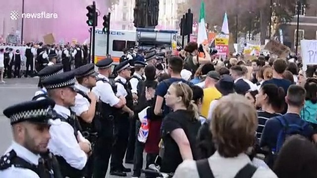 Hundreds protest Boris Johnson outside Downing Street in London