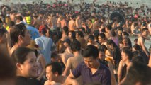 Thousands of weekend day trippers pack Sam Son beach in northern Vietnam
