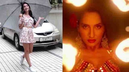 Nora Fatehi enjoys the rain during Batla House's O Saki Saki promotion; Watch video | FilmiBeat
