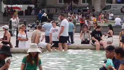 Londoners cool off in fountains on 2nd hottest UK day ever