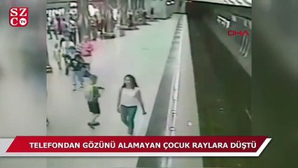 Telefondan gözünü alamayan çocuk raylara düştü