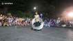 Hoop, there it is! Vietnam woman uses FIFTY metal hoops in mesmerizing dance routine