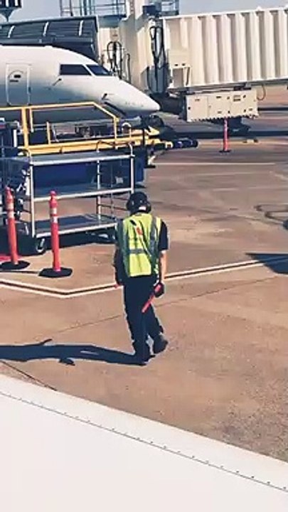 AirportAn American Airlines employee busted out some fly moves on an airport tarmac, and a passenger caught the joyful dance on video.