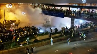 Hong Kong Masked men attack protesters