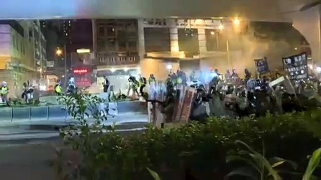 Tear gas: Hong Kong police and protesters clash