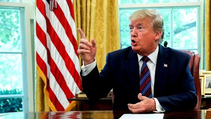 Outrage as Trump brands mostly black Baltimore 'infested mess'