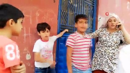 Apartman kapsını sıkıca tuttu, kadın hırsızları böyle  yakalattı